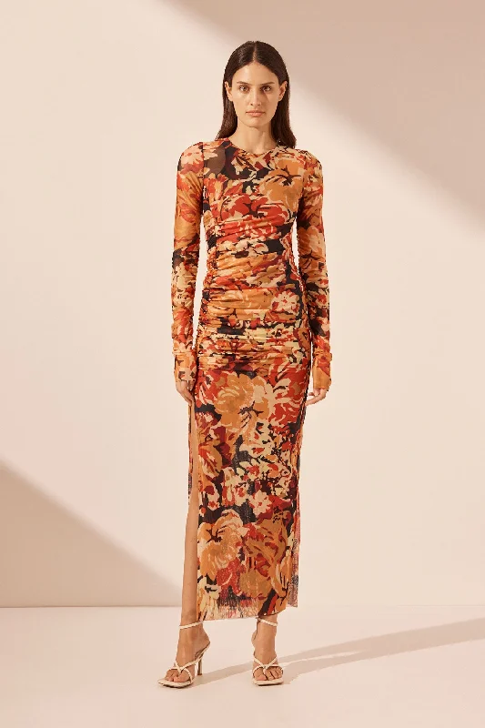 Midi dresses with geometric cutouts for a contemporary and edgy look RUBI LONG SLEEVE GATHERED MIDI DRESS Midi dresses with geometric cutouts for a contemporary and edgy look RUBI LONG SLEEVE GATHERED MIDI DRESS
