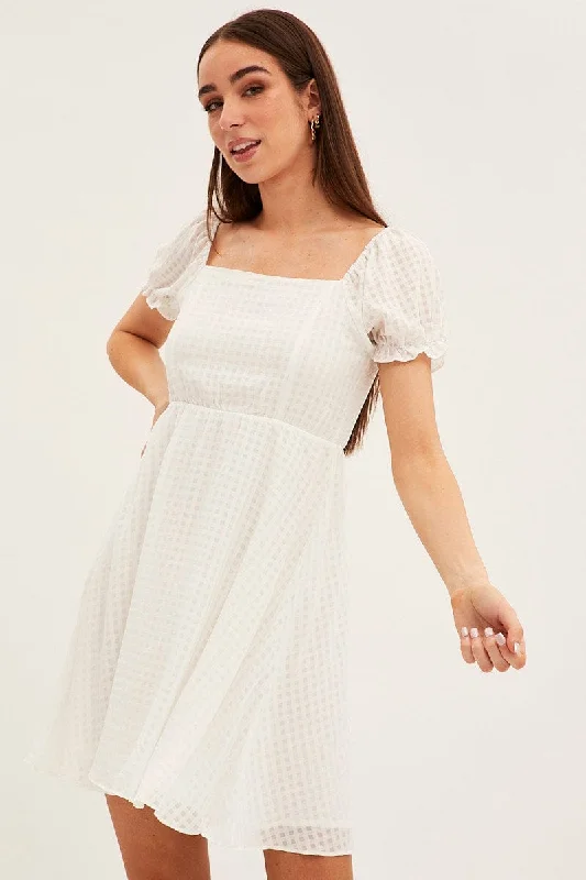 Midi dresses with tiered skirts for a bohemian festival look White Square Neck Puff Sleeve Skater Dress Midi dresses with tiered skirts for a bohemian festival look White Square Neck Puff Sleeve Skater Dress