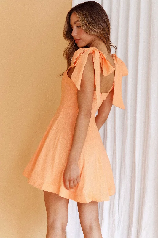 Printed Abstract Women Dress for a Modern and Artistic AppealJeanie Bow Shoulder Mini Dress Orange Printed Abstract Women Dress for a Modern and Artistic AppealJeanie Bow Shoulder Mini Dress Orange