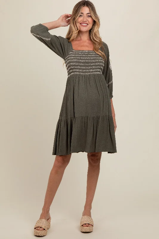 High - low midi dresses with geometric patterns for a modern partyOlive Smocked Embroidered Damask Maternity Dress High - low midi dresses with geometric patterns for a modern partyOlive Smocked Embroidered Damask Maternity Dress