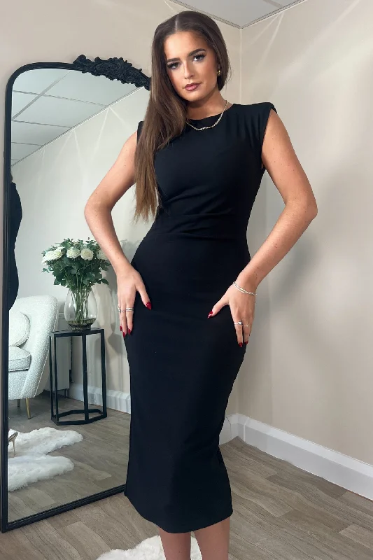 Midi dresses with pleated skirts for a timeless and elegant appealPari Black Ruched Shoulder Pad Midi Dress Midi dresses with pleated skirts for a timeless and elegant appealPari Black Ruched Shoulder Pad Midi Dress