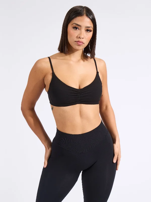 racerback women sport bra for freedom of movementButtercup Sports Bra - Onyx Black