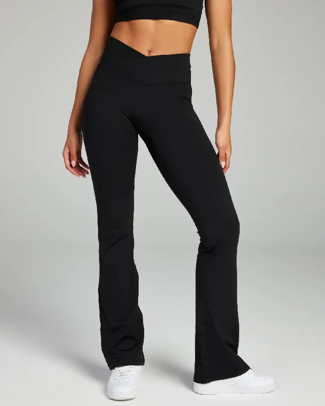 women tights with a wide waistband for a non - restrictive fitCross Over Flare Leggings - Black women tights with a wide waistband for a non - restrictive fitCross Over Flare Leggings - Black