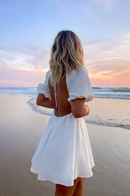 Mini dresses with asymmetric hems for a fashion - forward lookCruising Through Dress White Mini dresses with asymmetric hems for a fashion - forward lookCruising Through Dress White