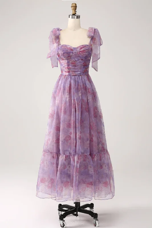 Mini cocktail dresses with a tiered ruffled skirt and a scoop neckPurple Printed A Line Pleated Long Prom Dress Mini cocktail dresses with a tiered ruffled skirt and a scoop neckPurple Printed A Line Pleated Long Prom Dress
